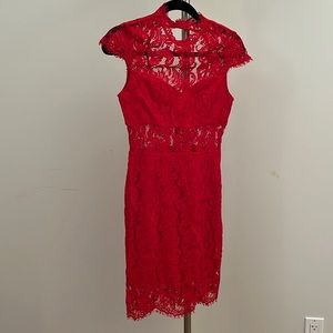 Red lace dress with open back.
